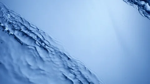 Two waves crossing the frame from both sides diagnolly. Stock Footage 92816102