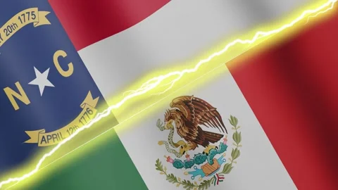 Two waving flags USA State of North Carolina and Mexico with diagonal lightning Stock Footage 334188979