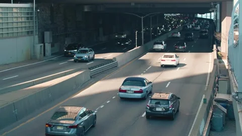 Two way traffic passing through underpass on freeway Stock-Footage 244604605