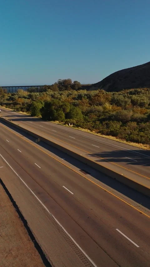 Two-ways roads going through the humpy mountainous territory. Stock Footage 277535658