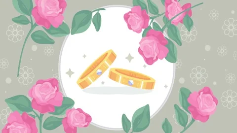 Two wedding rings fall to the center of the screen 스톡 동영상 331246135