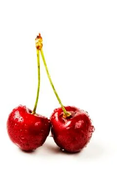 Two wet cherries Stock Photos