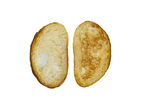 Two wheat toast on a white background close-up Stock Photos
