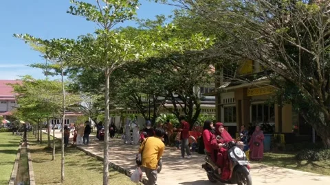 Two-wheeled vehicles passing Stock Footage 248900308