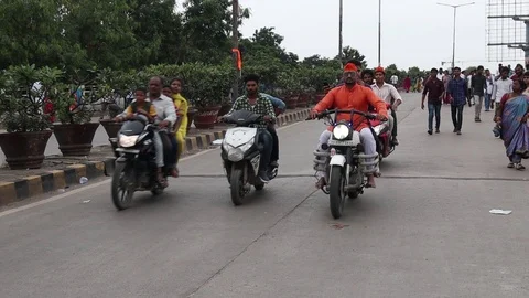Two-wheeler-riders-two-finger-salute Stock Footage 115941866