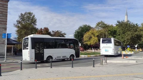 Two white buses on the road Stock Footage 218626315