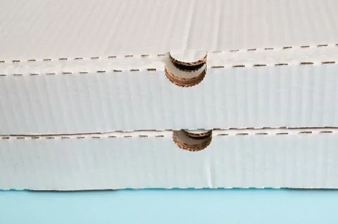 Two white cardboard pizza boxes Stock Photos