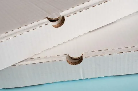 Two white cardboard pizza boxes Stock Photos