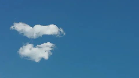 Two white clouds on a blue sky 4k Video stock 49212594