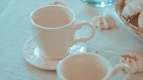 Two White Cups Stand on a Table Video stock 68670429