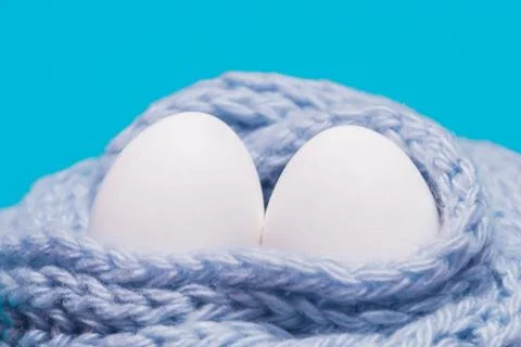 Two white eggs Stock Photos