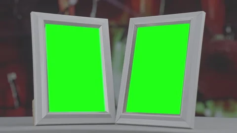 Two white picture frames with green chroma key screens Stock Footage 289438832