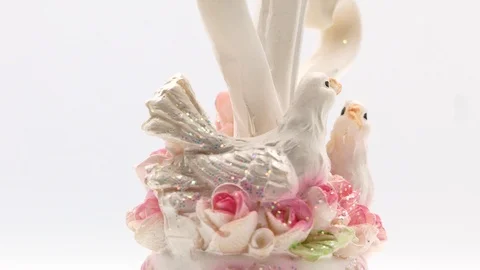 Two white pigeons statuette on white background Stock Footage 108634409