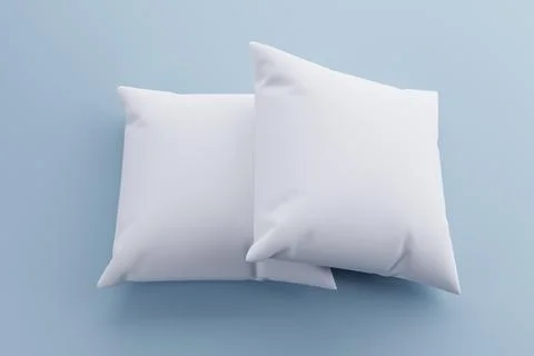 Two white pillows on blue background, mockup (1) Stock Illustration