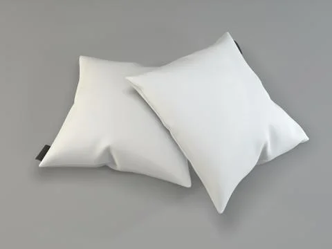Two white pillows on a gray background.  Mockup square pillows. White sofa cu Stock Photos
