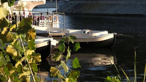 Two White plastic boats on a river at sunny day. Stock Footage 124245202