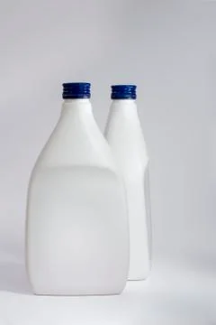 Two white plastic bottles Stock Photos