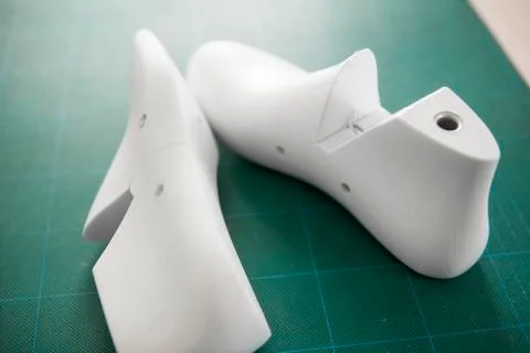 Two white plastic last shoe on rubber secondary cut cutting mat, The equipment Stock Photos