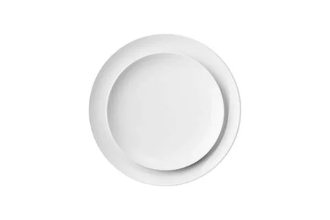 Two white plates of different sizes isolated on white background. Top view. Set Stock Photos