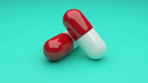 Two white-red pills isolated on green background. Stock Illustration
