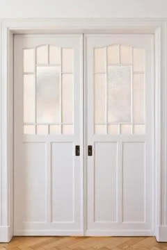Two white sliding doors frontal Stock Photos