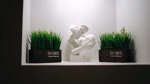 Two white statues in the form of kissing lovers. Shooting in motion. Stock Footage 343796766