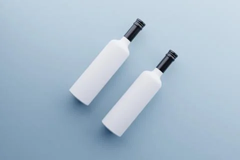 Two white wine bottles mockup, pastel blue background, product placement Stock Illustration