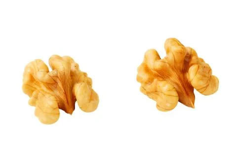 Two whole walnuts with natural shell Stock Photos