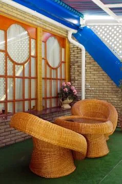 Two wicker chairs Stock Photos