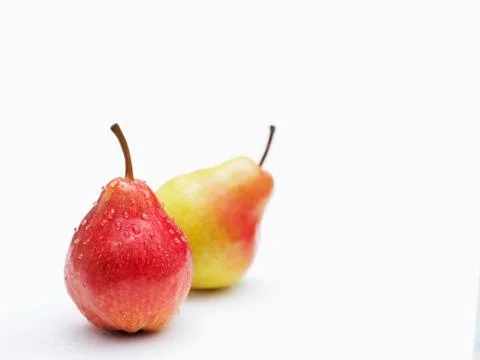 Two Williams pears with drops of water Stock Photos