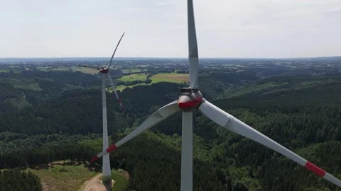 Two wind turbines overlooking the hurtgenwald, Germany, renewable energy, hills 스톡 동영상 311953264