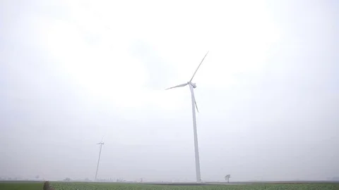 Two Wind Turbines Working. Long shot Stock Footage 72316318