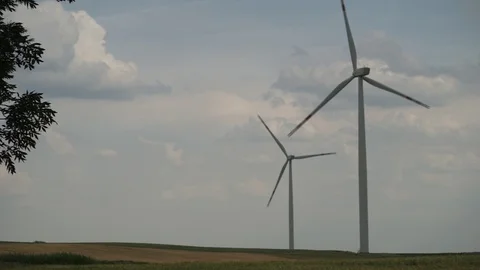 Two windmill turbines on plains Stock Footage 91268932