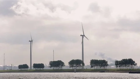 Two windmills in Dutch landscape Stock Footage 83165424