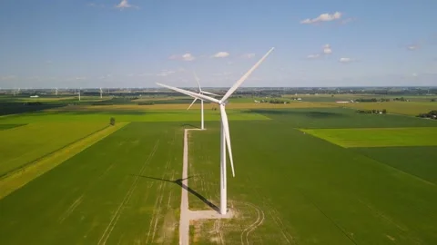 Two windmills in the middle of Soy bean fields in Michigan countryside, Aer.. Stock Footage 308195723