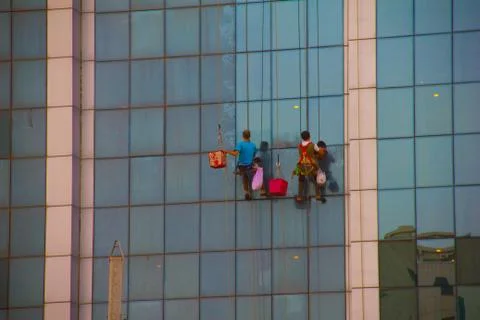 Two Window Cleaners Abseiling a Skyscraper While Working in Erbil Stock Photos
