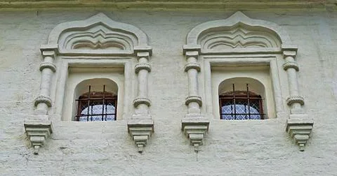 Two windows in ancient monastery Stock Photos