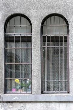 Two windows with bars. Stock Photos