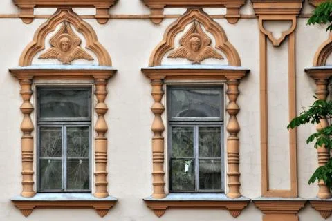 Two Windows with moldings. Stock Photos