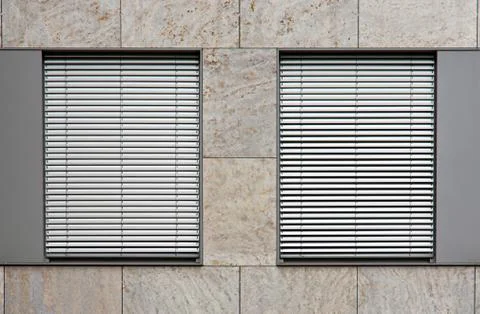 Two windows with shutters Stock Photos