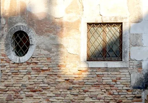 Two windows in square and oval shape Stock Photos
