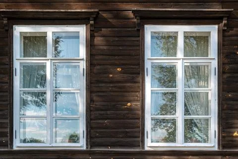 Two windows with white frames. Stock Photos