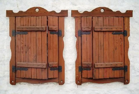 Two windows on the white wall Stock Photos