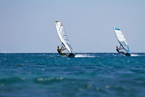 Two windsurfers in action Stock Photos