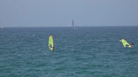 Two windsurfers in the sea Stock Footage 109485906