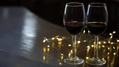 Two wineglasses of red wine . 動画素材 84204136