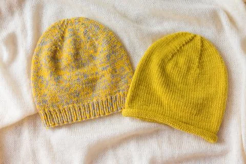 Two winter cap on whaite background Stock Photos