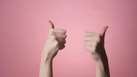 Two woman's hand showing thumb up sign 库存影片 171540922