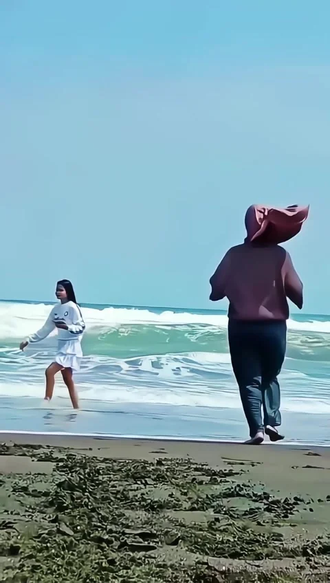 Two women on the beach Stock Footage 282880253