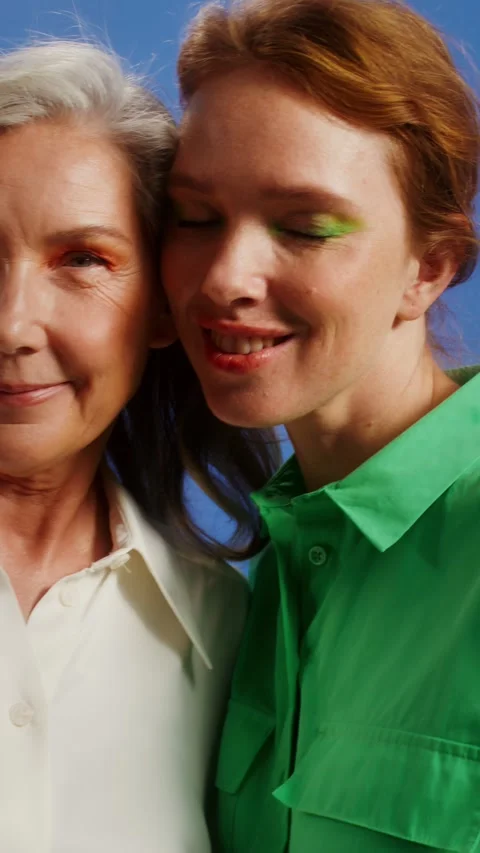Two women with a big age difference hugging - Model. Stock Footage 323941665